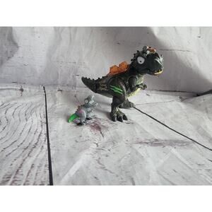 Zuru Smashers Mega Dino T Rex Dinosaur Figure w/ Axe In Head 3.25in With Baby